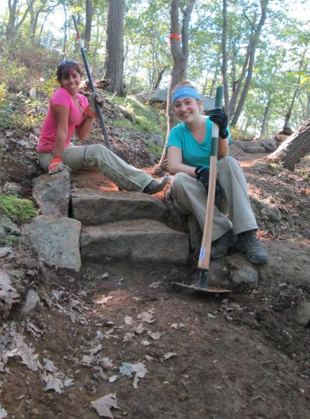 Loraine Almeida and Rachel Riccardi pose with a small step project they built.