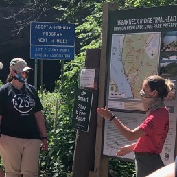 Trail Steward educating trail users in Hudson Highlands State Park Preserve.