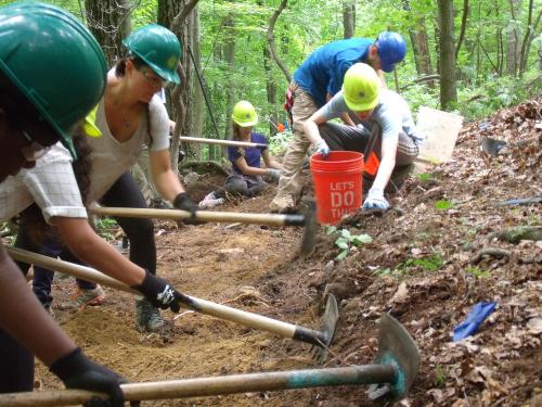 Volunteers work with the Trail Conference Conservation Corps' Palisades Trail Crew on the Red Back Trail in Sterling Forest State Park. Photo by Robert Fernandez.