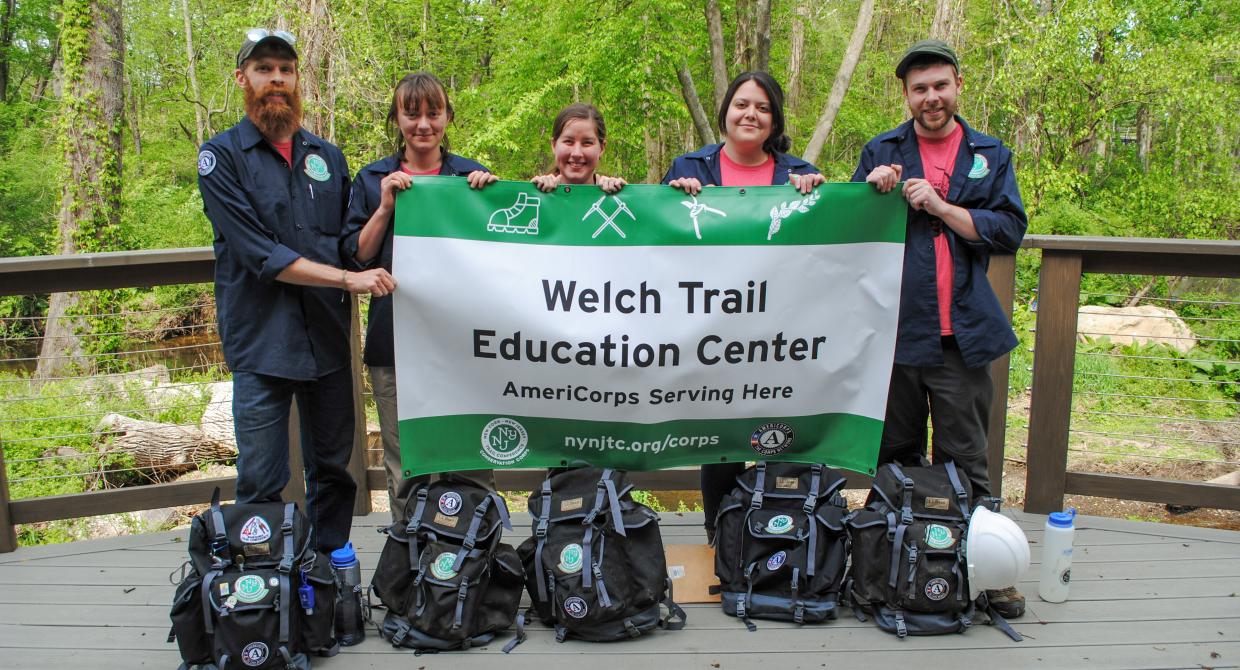 Conservation Corps crew leaders with packs donated from L.L. Bean and patch sewing done by Meadtown Cleaners. Photo by Heather Darley.