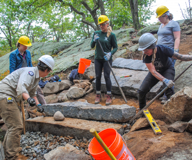 Volunteers set steps on the Appalachian Trail at Bear Mountain. Photo by Heather Darley.