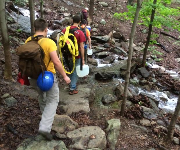 The Taconic Trail Crew hikes the Wilkinson Trail at Breakneck Ridge to get to their work site. Photo by Erik Mickelson