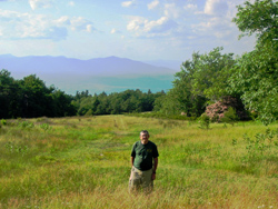 Former Golf course with Dan Chazin and Catskill views in background.