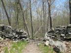Vernal Pool Trail passes throught stone wall. Photo by Daniel Chazin.
