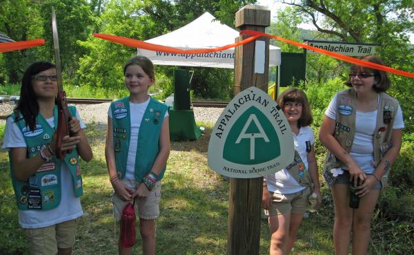 Girls Scouts cut the ribbon opening the new AT boardwalk in Pawling, NY July 1, 2012.