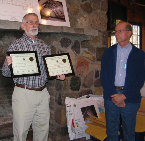 Frank Dogil (r) receives his award from Jim Haggett, chair of the Dutchess-Putnam A.T. Committee.