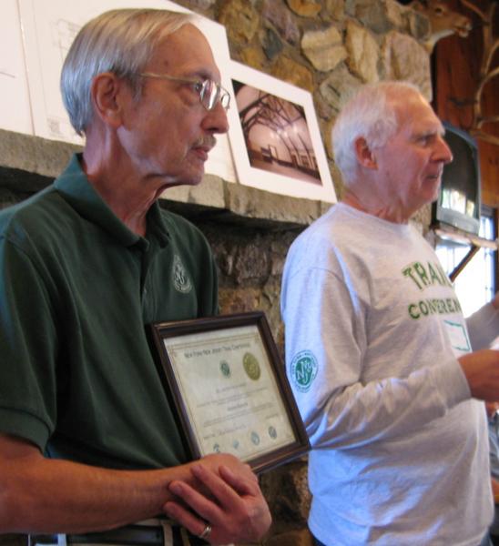 Steve Zubarik gets award from Trails Chair John Mack.