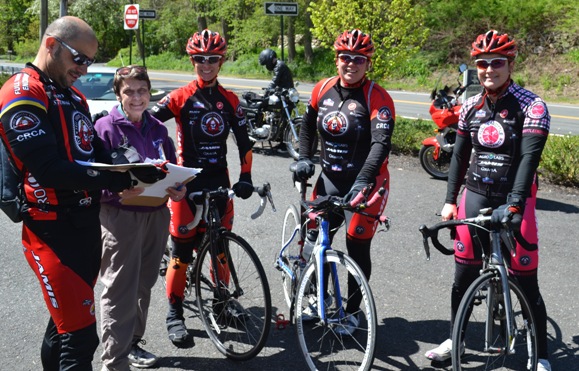 Cyclists support building height limit on Palisades.Trail Conference board member Charlotte Fahn collects petition signatures on the Palisades.