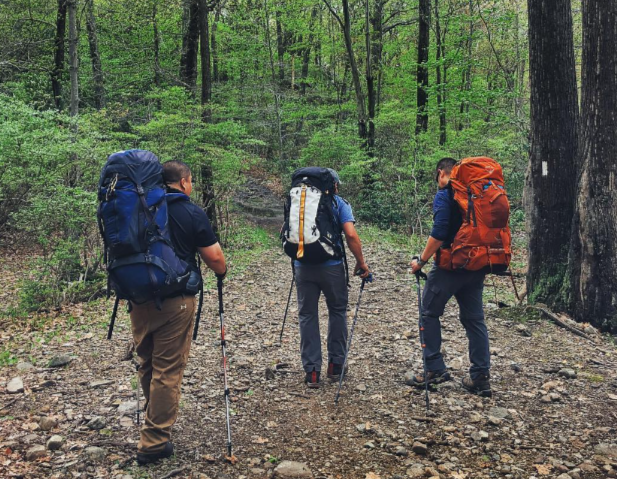 hiking essentials hikers on the trail
