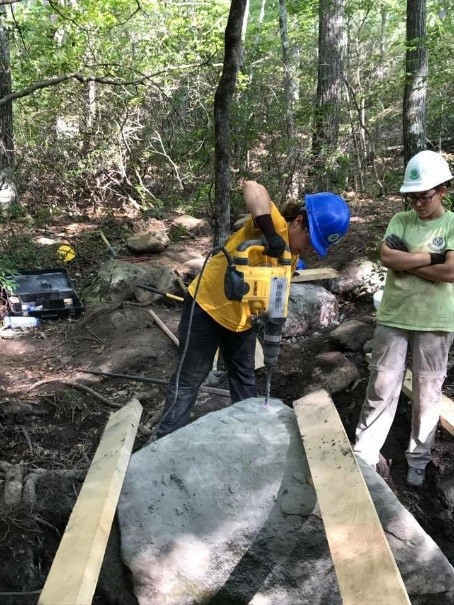 Sam drilling a rock in Sterling Forest State Park. Sam drilling a rock in Sterling Forest State Park.