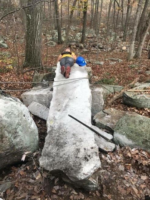 Crew member Sam taking a well-deserved break in Sterling Forest State Park. Crew member Sam taking a well-deserved break in Sterling Forest State Park.