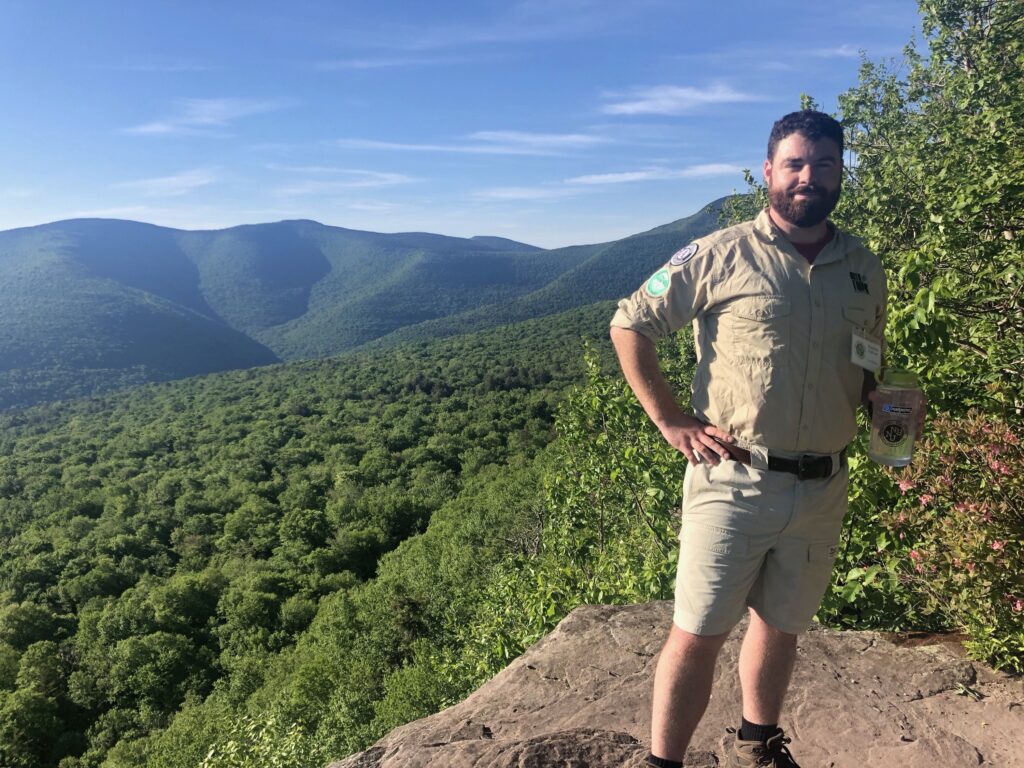Trail Steward Stephen at the Catskill's Giant Ledge. Photo by Melissa Cascini. Trail Steward Stephen at the Catskill's Giant Ledge. Photo by Melissa Cascini.