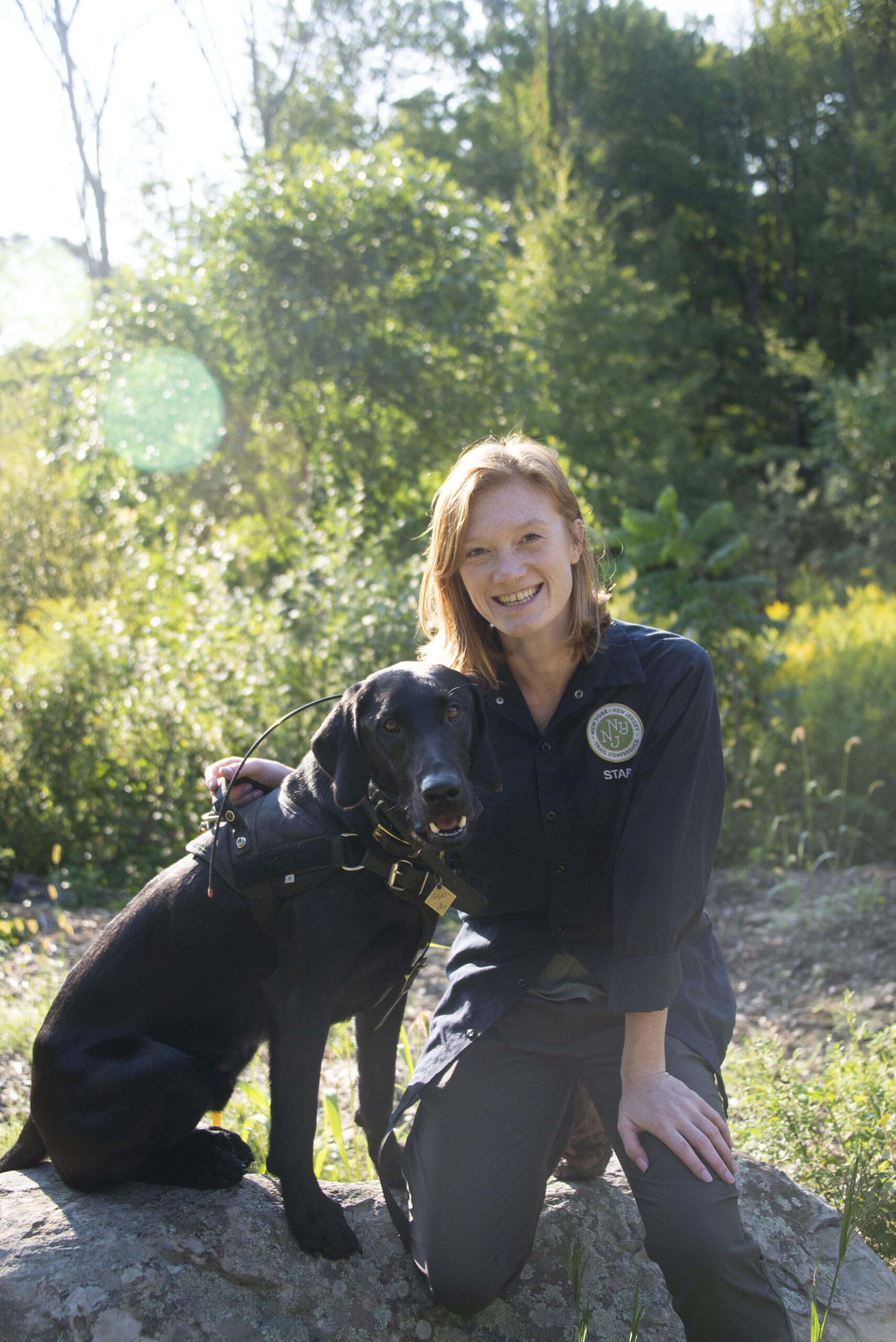 Arden and Peat take a break while searching for bobcat skat