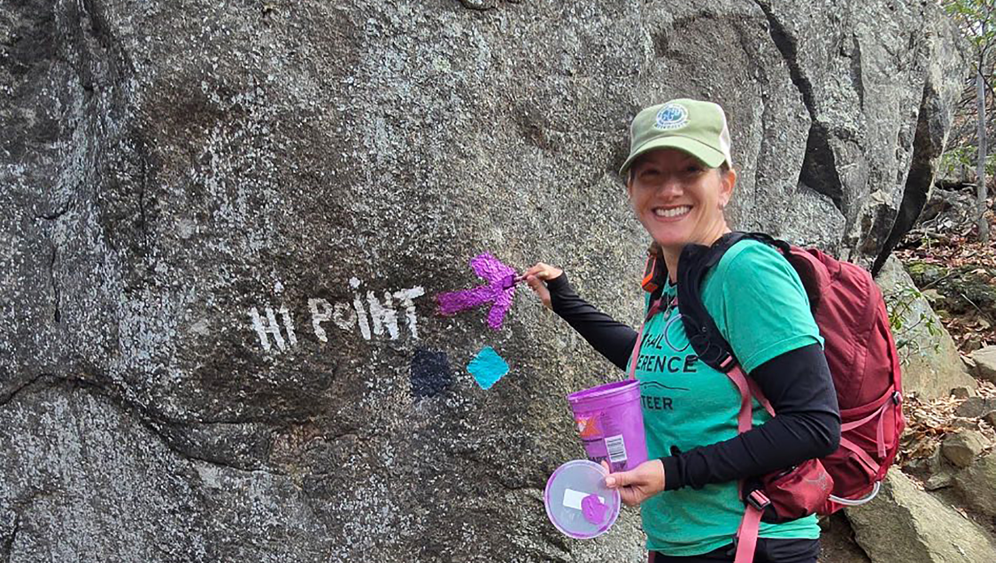 NYNJTC Volunteer reblazing trail markings at Norvin Green State Forest